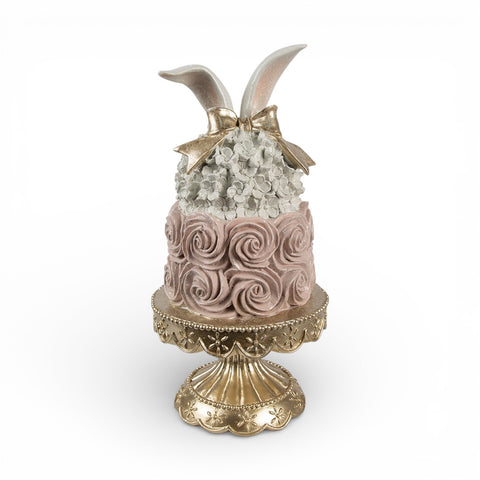 Statuetta decorativa torta su piedistallo con orecchie di coniglio – Ø 17x35 cm (bianco/rosa, plastica) by Clayre & Eef