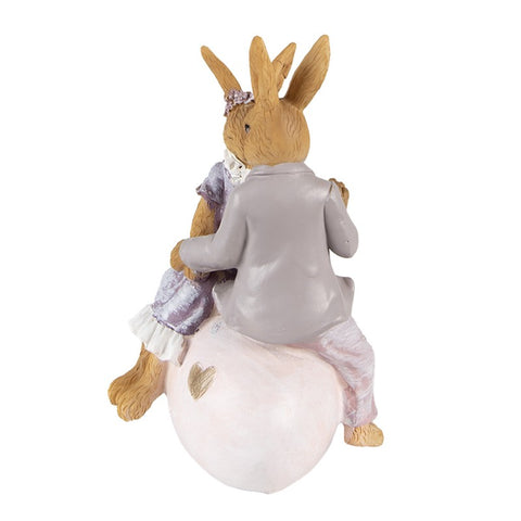 Rabbits in love on egg