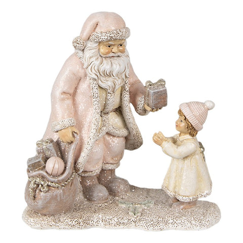 Statuina Babbo Natale distribuisce doni