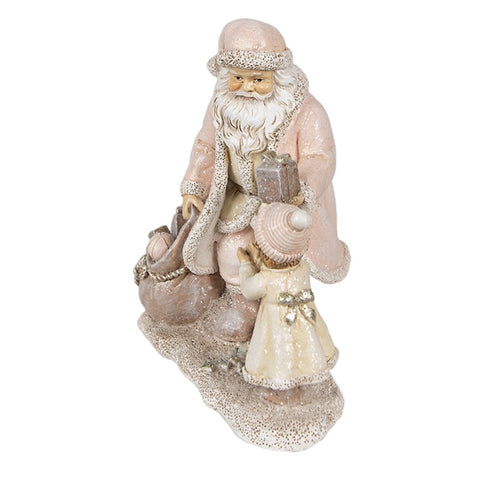 Statuina Babbo Natale distribuisce doni