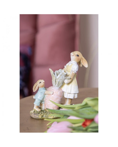 Rabbit figurine with carrot