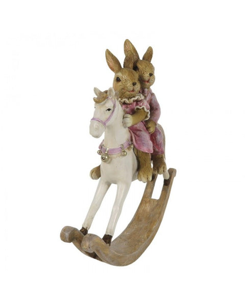 Bunnies on a rocking horse