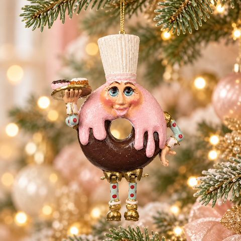 Donut Chef con glassa rosa sull’albero di Natale