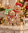 Famiglia di omini di pan di zenzero con LED Clayre & Eef 31x10x34 cm in ambientazione natalizia