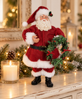 Statuetta Babbo Natale con ghirlanda 28 cm in ambientazione natalizia