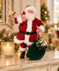 Statuetta Babbo Natale con sacco regali 16x8x28 cm in ambientazione natalizia