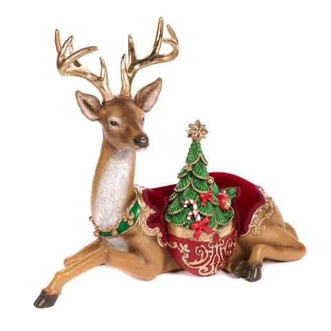 Decorative figurine of a sitting reindeer with a little tree