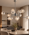 Lampada a Sospensione Moderna in Ferro Cromo Lucido con Sfere in Vetro – Bonetti Illumina Ikarus, 6, 8 e 12 Luci ambientata