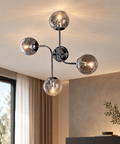 Plafoniera Moderna in Ferro Cromo Lucido con Sfere in Vetro – Bonetti Illumina Ikarus, 4 Luci, 63x59 cm ambientata