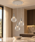Lampada a Sospensione Moderna con Vetri Pyrex Trasparenti, Ambra o Grigi – Bonetti Illumina Pluvia, 1 e 3 Luci ambientata