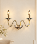 Applique Classica in Ferro Dorato con Vetro Trasparente – Bonetti Illumina Franz, 2 Luci ambientata in un interno classico