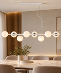 Lampada a Sospensione Moderna in Ferro Bianco e Cromo o Nero e Bronzo – Bonetti Illumina Adrian, 5, 6 e 8 Luci ambientata
