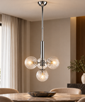 Lampada a Sospensione Moderna in Ferro Cromato o Bronzato con Sfere in Vetro – Bonetti Illumina Armonia, 4 Luci, Ø32 cm ambientata