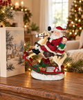Babbo Natale su cavallo a dondolo 18 x 9 x 23,3 cm ambientato su mobile natalizio