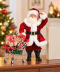 Babbo Natale Goodwill con carrello alto 27 cm ambientato su mobile natalizio