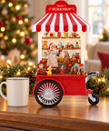 Carretto musicale di Babbo Natale 30 x 18 cm ambientato su mobile natalizio