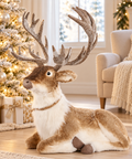 Renna Natalizia Seduta Decorativa – Goodwill, 70cm in ambientazione natalizia